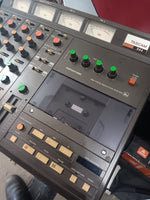 Tascam - 244 Portastudio
